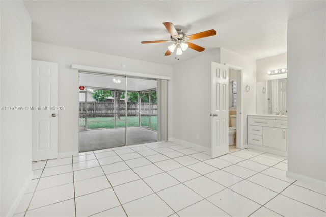 8101 NW 44th Ct, Lauderhill, FL 33351 - empty room with ceiling fan and light tile patterned flooring
