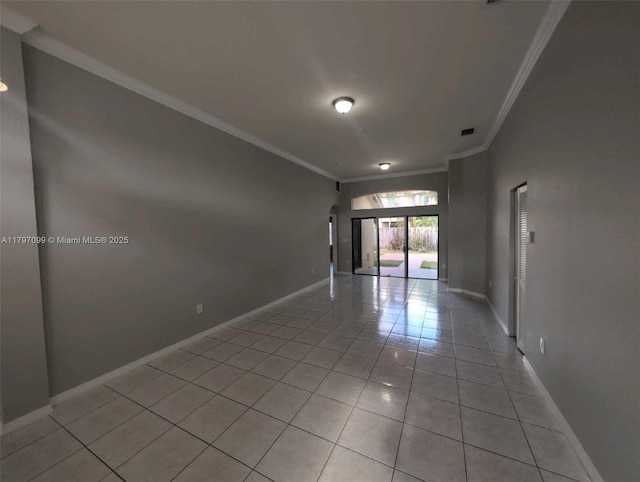 22664 SW 109th Path, Miami, FL 33170 - empty room with crown molding, light tile patterned flooring, and baseboards