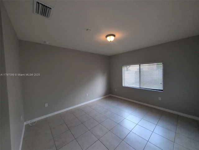 22664 SW 109th Path, Miami, FL 33170 - empty room featuring baseboards and light tile patterned floors