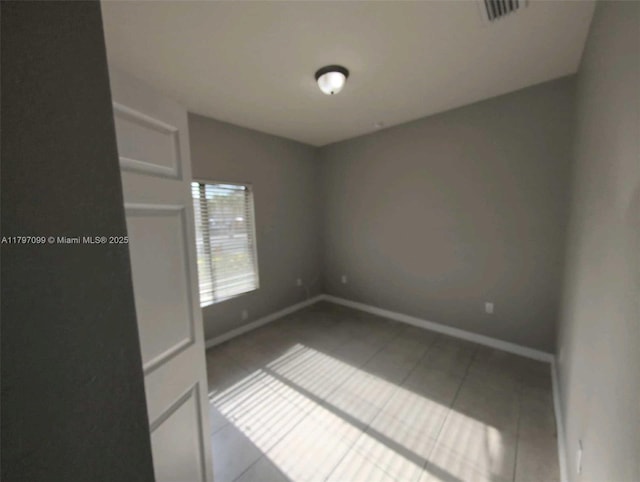 22664 SW 109th Path, Miami, FL 33170 - tiled spare room featuring baseboards