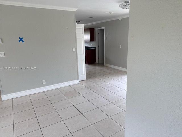 4920 NW 11th St, Lauderhill, FL 33313 - spare room with crown molding, light tile patterned floors, and baseboards