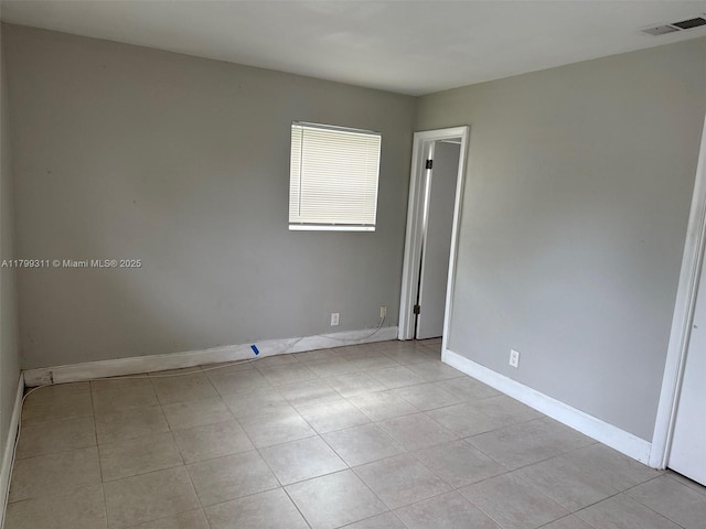 4920 NW 11th St, Lauderhill, FL 33313 - unfurnished room featuring light tile patterned floors and baseboards