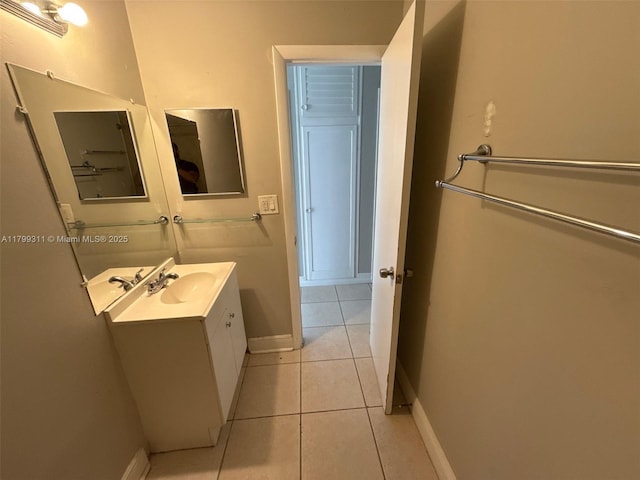 4920 NW 11th St, Lauderhill, FL 33313 - bathroom with tile patterned flooring, vanity, and baseboards