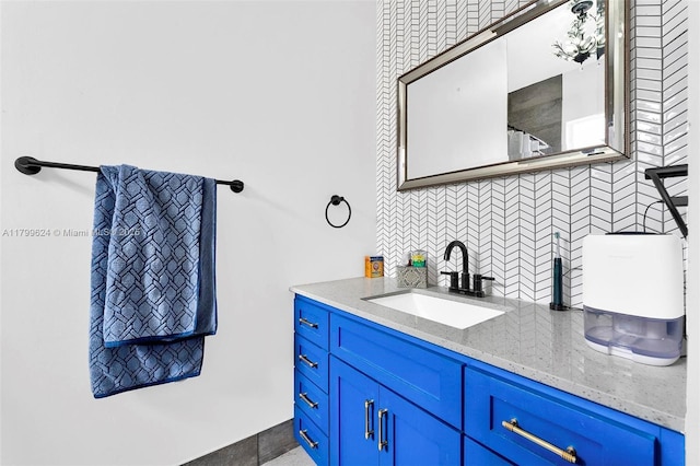 2625 SE 5th Ct, Homestead, FL 33033 - bathroom with decorative backsplash and vanity