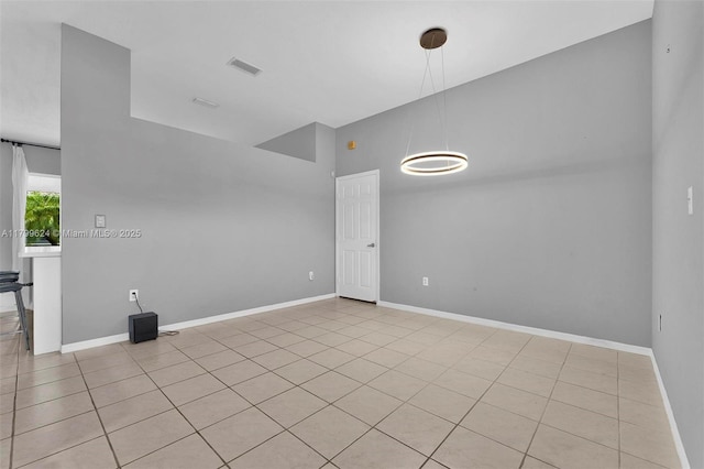 2625 SE 5th Ct, Homestead, FL 33033 - empty room with baseboards and light tile patterned flooring