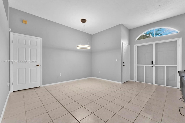 2625 SE 5th Ct, Homestead, FL 33033 - unfurnished dining area featuring light tile patterned floors and baseboards