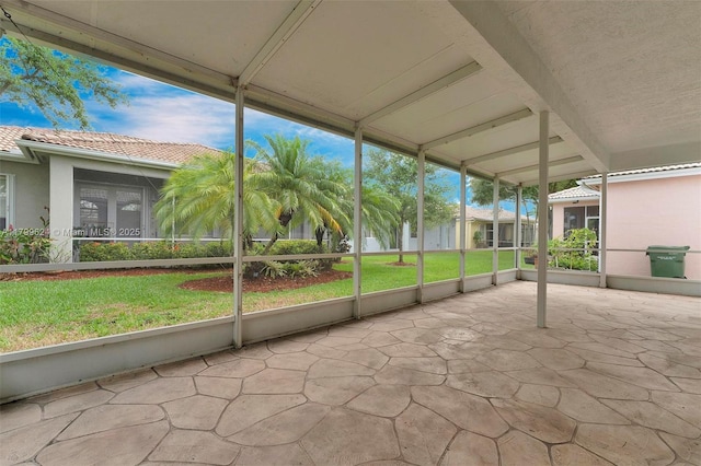 2625 SE 5th Ct, Homestead, FL 33033 - unfurnished sunroom featuring beamed ceiling
