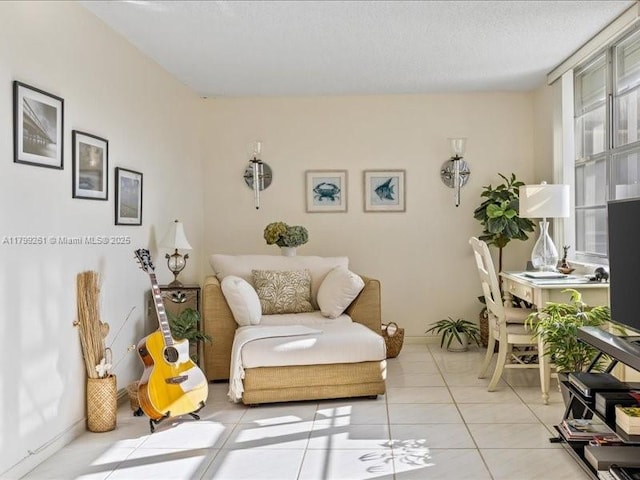 living area featuring light tile patterned floors
