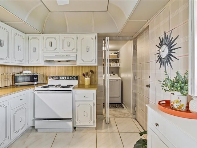 kitchen with white range with electric stovetop, washer / dryer, under cabinet range hood, white cabinetry, and light countertops