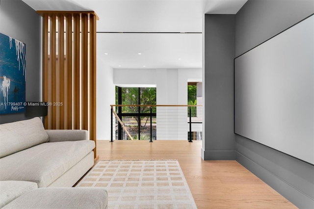 living room featuring wood finished floors and recessed lighting