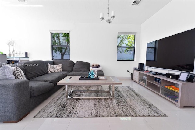 25079 SW 114th Ct, Homestead, FL 33032 - living area with plenty of natural light, a chandelier, and tile patterned floors