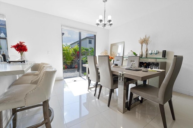 25079 SW 114th Ct, Homestead, FL 33032 - dining space with a chandelier, baseboards, and light tile patterned flooring
