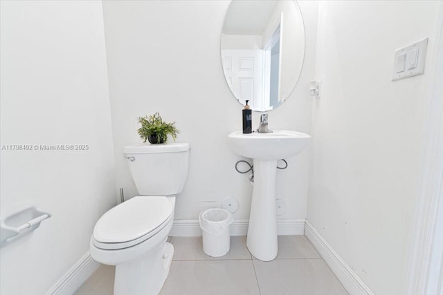 25079 SW 114th Ct, Homestead, FL 33032 - half bath featuring toilet, tile patterned floors, and baseboards