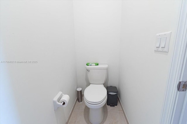 25079 SW 114th Ct, Homestead, FL 33032 - bathroom with tile patterned flooring, toilet, and baseboards