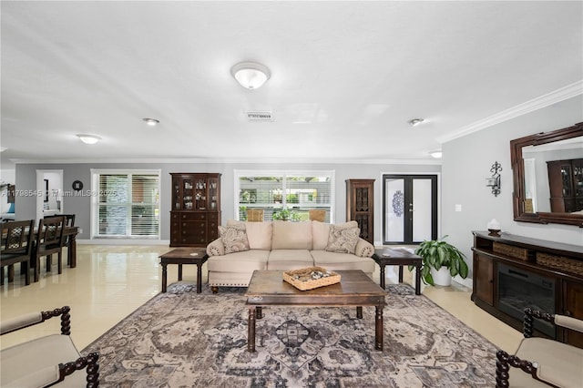 17514 SW 82nd Ct, Palmetto Bay, FL 33157 - living room with ornamental molding, healthy amount of natural light, and light tile patterned floors