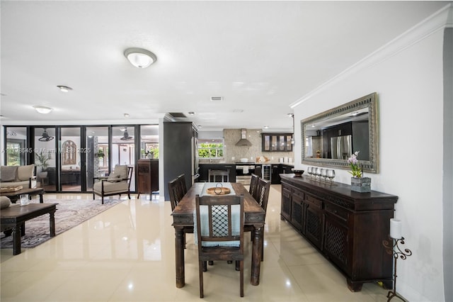 17514 SW 82nd Ct, Palmetto Bay, FL 33157 - dining room with ornamental molding and light tile patterned floors
