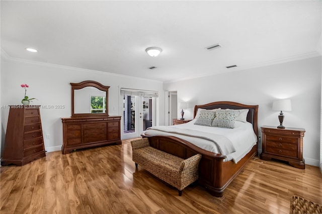 17514 SW 82nd Ct, Palmetto Bay, FL 33157 - bedroom featuring crown molding, wood finished floors, and access to exterior