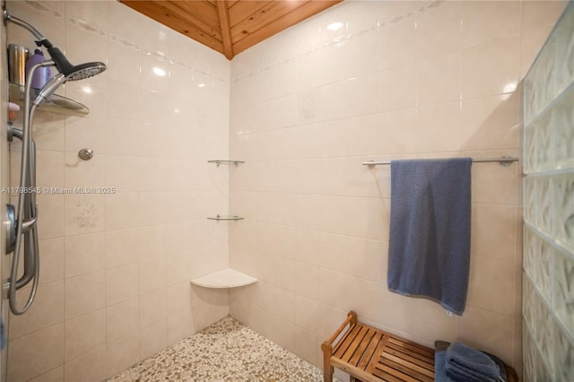 full bath with tiled shower