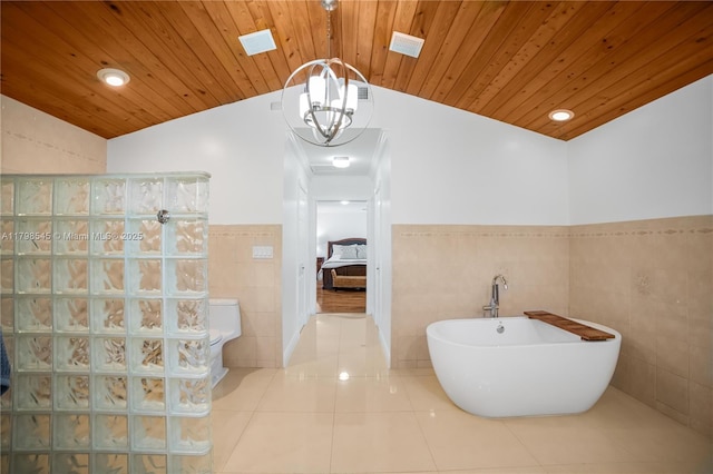 full bathroom featuring tile walls, lofted ceiling, tile patterned floors, a walk in shower, and wooden ceiling