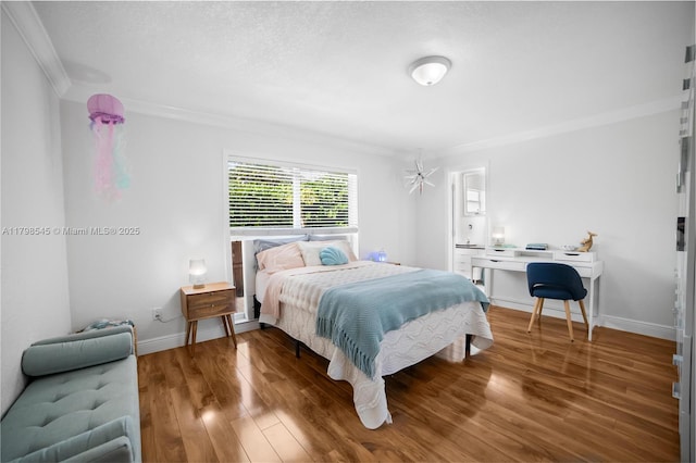 17514 SW 82nd Ct, Palmetto Bay, FL 33157 - bedroom featuring ornamental molding, wood finished floors, and a textured ceiling