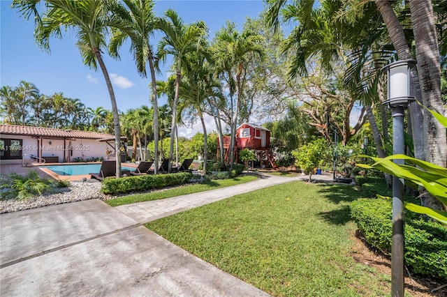 17514 SW 82nd Ct, Palmetto Bay, FL 33157 - view of grassy yard featuring an outdoor pool