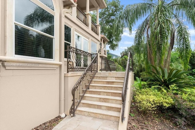 12 Tidewater Dr, Ormond Beach, FL 32174 - doorway to property featuring stucco siding