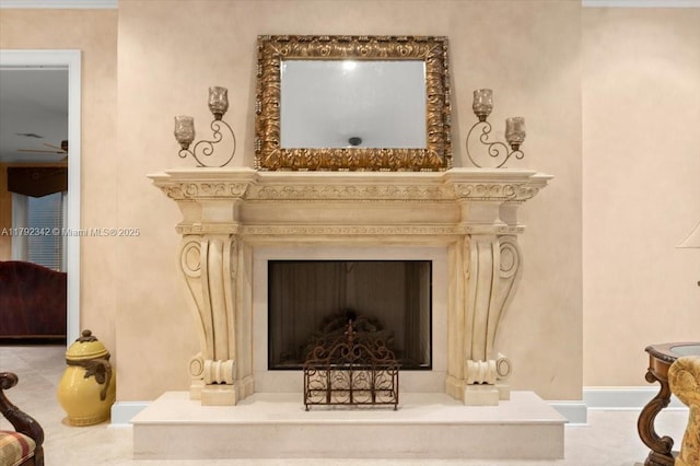 12 Tidewater Dr, Ormond Beach, FL 32174 - detailed view of a fireplace with raised hearth and baseboards