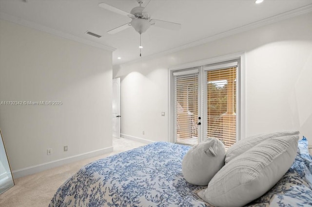 12 Tidewater Dr, Ormond Beach, FL 32174 - bedroom featuring light carpet, access to exterior, baseboards, crown molding, and recessed lighting
