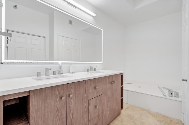 3400 NE 192nd St Unit Ph11, Aventura, FL 33180 - full bathroom featuring double vanity and a bath