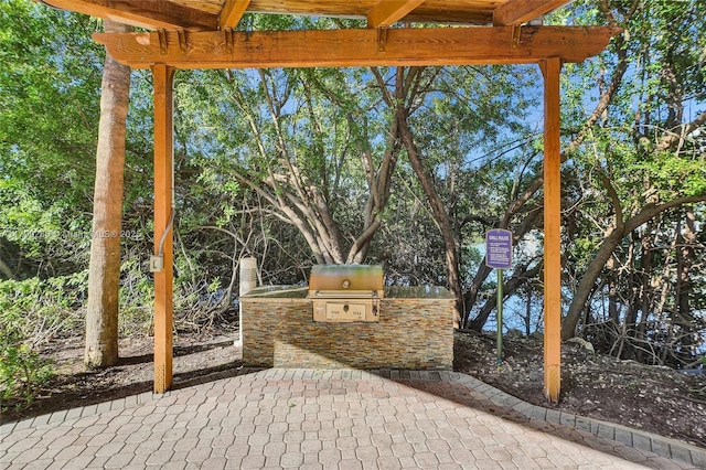 3400 NE 192nd St Unit Ph11, Aventura, FL 33180 - view of patio / terrace with an outdoor kitchen and a grill