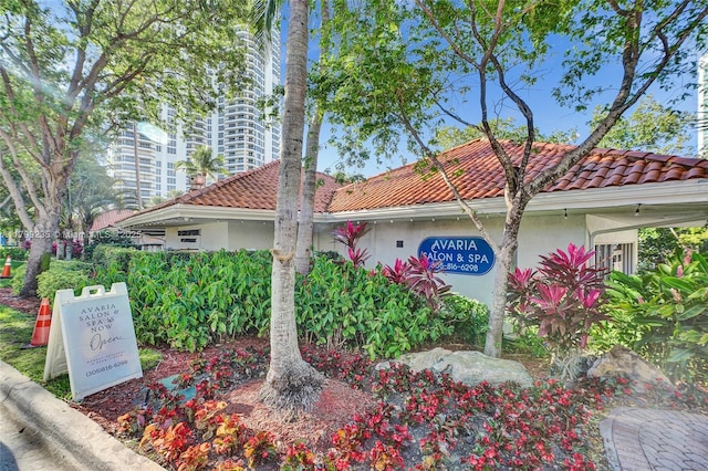 3400 NE 192nd St Unit Ph11, Aventura, FL 33180 - view of front of property featuring stucco siding and a tiled roof