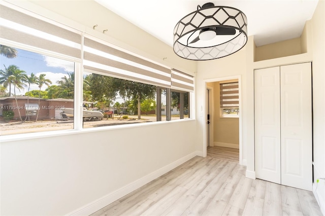 327 S 28th Ave, Hollywood, FL 33020 - unfurnished bedroom featuring a closet, wood finished floors, and baseboards