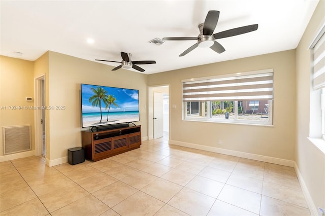 327 S 28th Ave, Hollywood, FL 33020 - unfurnished living room featuring a ceiling fan, light tile patterned floors, and baseboards