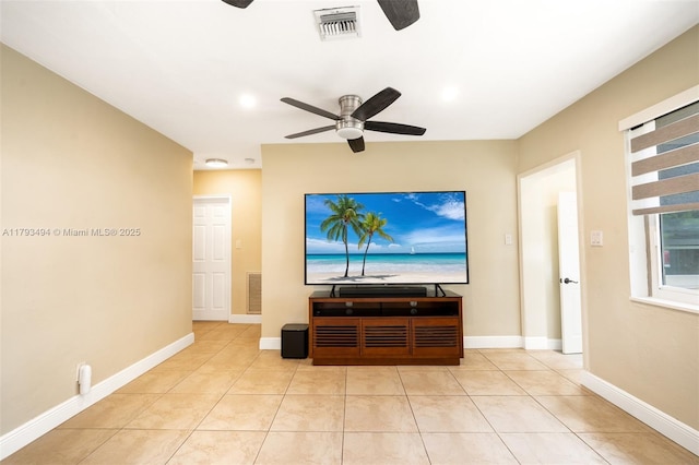 327 S 28th Ave, Hollywood, FL 33020 - living room featuring a ceiling fan, light tile patterned floors, and baseboards