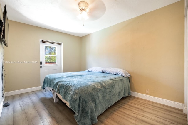 327 S 28th Ave, Hollywood, FL 33020 - bedroom with light wood finished floors, baseboards, and ceiling fan