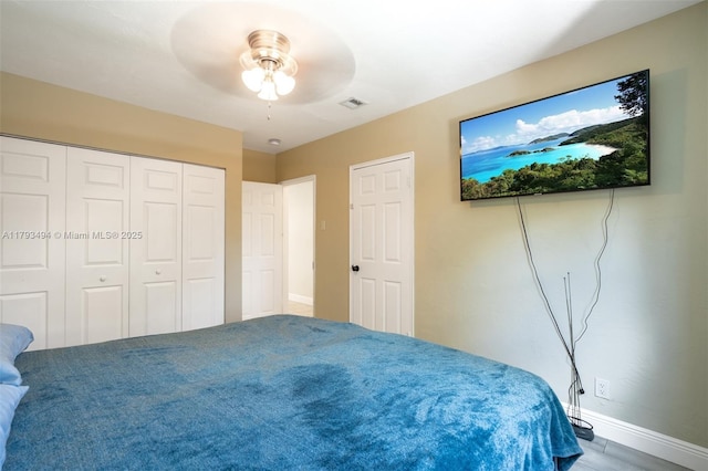 327 S 28th Ave, Hollywood, FL 33020 - bedroom featuring baseboards, a closet, a ceiling fan, and wood finished floors