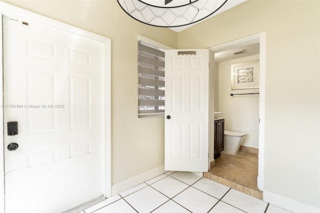 327 S 28th Ave, Hollywood, FL 33020 - bathroom featuring toilet, baseboards, and tile patterned flooring