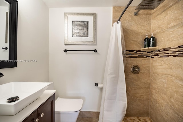 327 S 28th Ave, Hollywood, FL 33020 - bathroom featuring a tile shower, toilet, and vanity