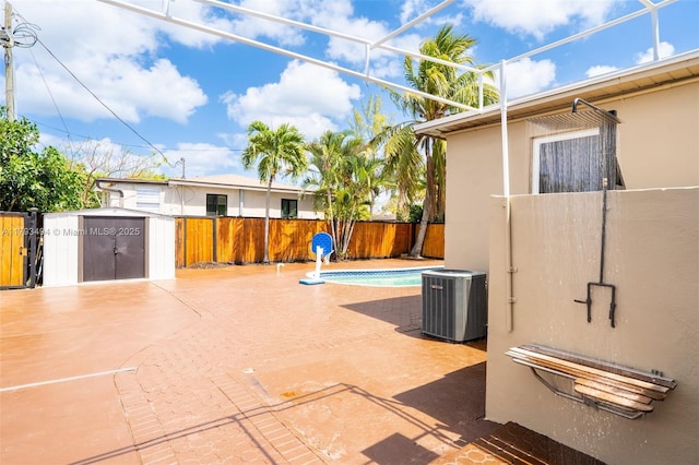 327 S 28th Ave, Hollywood, FL 33020 - view of patio with cooling unit and a fenced backyard