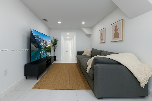 2966 NW 26th St, Miami, FL 33142 - living room with recessed lighting, baseboards, and light marble finish flooring