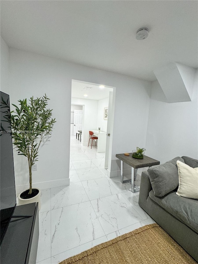 2966 NW 26th St, Miami, FL 33142 - living area with light marble finish flooring, baseboards, and recessed lighting
