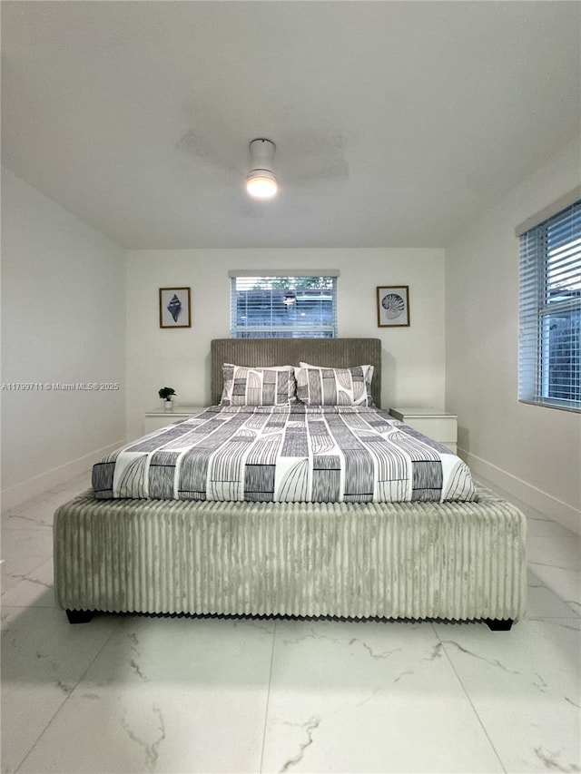 2966 NW 26th St, Miami, FL 33142 - bedroom with marble look tiles, baseboards, and ceiling fan
