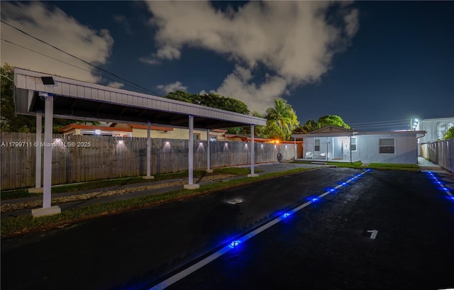 2966 NW 26th St, Miami, FL 33142 - yard at twilight featuring fence