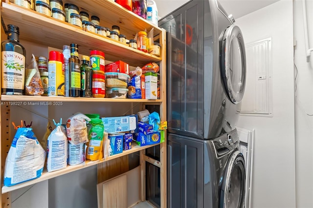 10 Aragon Ave Unit 1107, Coral Gables, FL 33134 - laundry room featuring stacked washer / dryer