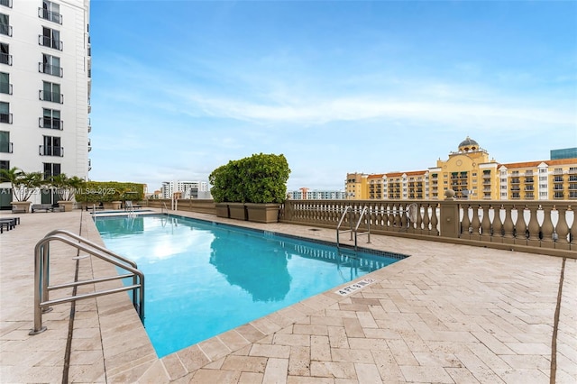 10 Aragon Ave Unit 1107, Coral Gables, FL 33134 - community pool featuring a patio