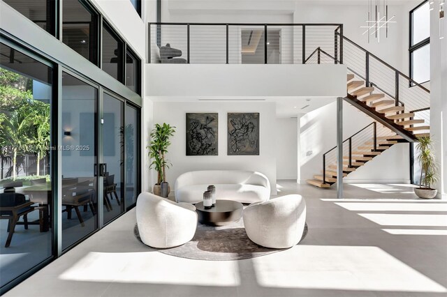 11143 NE 8th Ave, Biscayne Park, FL 33161 - lobby featuring a towering ceiling and stairs