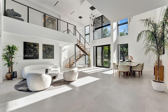 11143 NE 8th Ave, Biscayne Park, FL 33161 - common area with a high ceiling and stairway