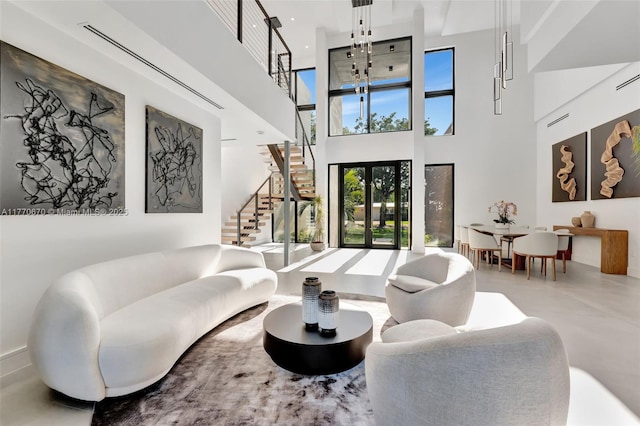 11143 NE 8th Ave, Biscayne Park, FL 33161 - common area with a towering ceiling and stairway