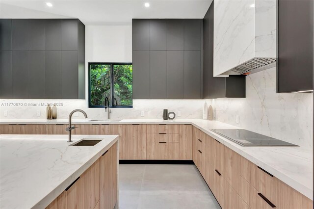 11143 NE 8th Ave, Biscayne Park, FL 33161 - kitchen featuring modern cabinets, light brown cabinets, black electric stovetop, and recessed lighting