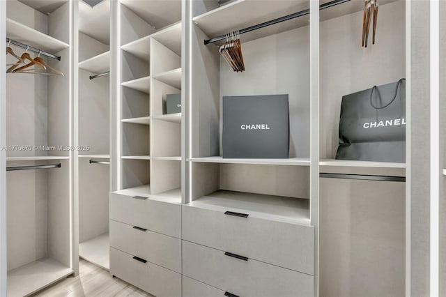 11143 NE 8th Ave, Biscayne Park, FL 33161 - walk in closet featuring wood finished floors